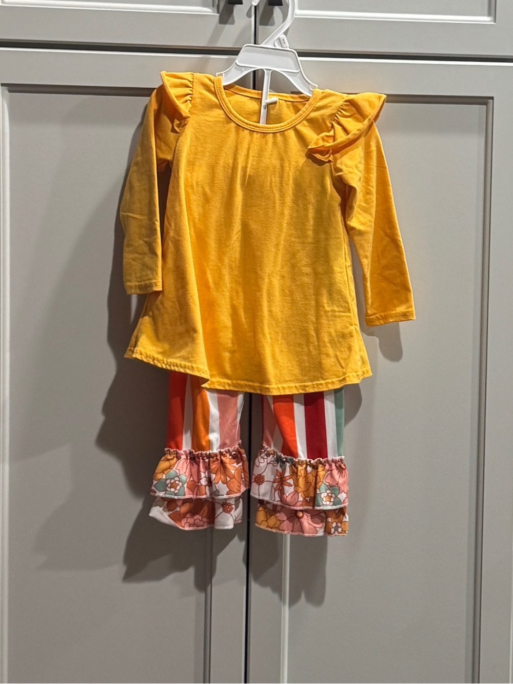 Yellow Children's Ruffle-Sleeve Top and Striped Pants with Ruffled Hems